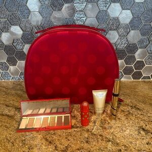 Estée Lauder beauty items and special edition train case